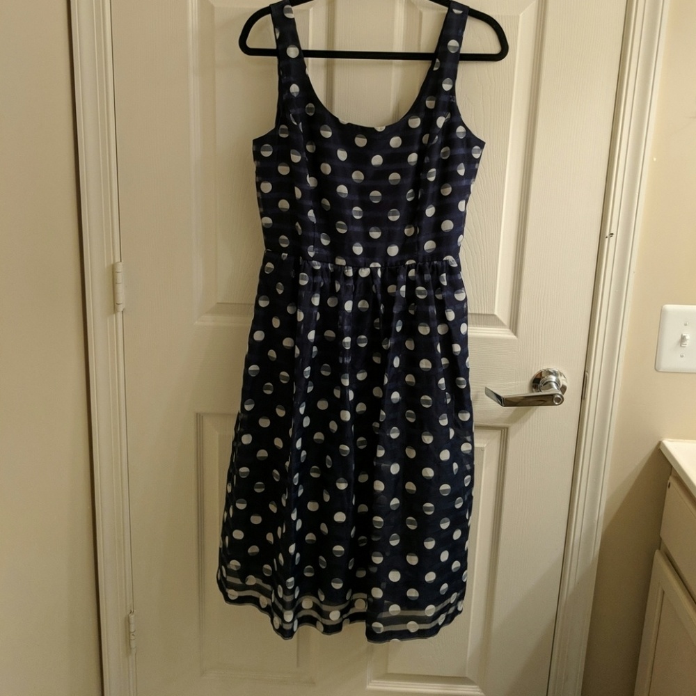 Navy polka dot cocktail dress